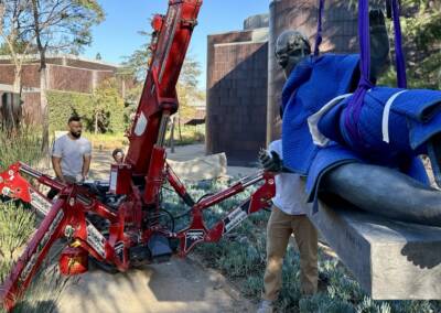 Zulu Heru operating a spider crane at Norton Simon Museum to preserve sculptures during L.A. fires, 2025